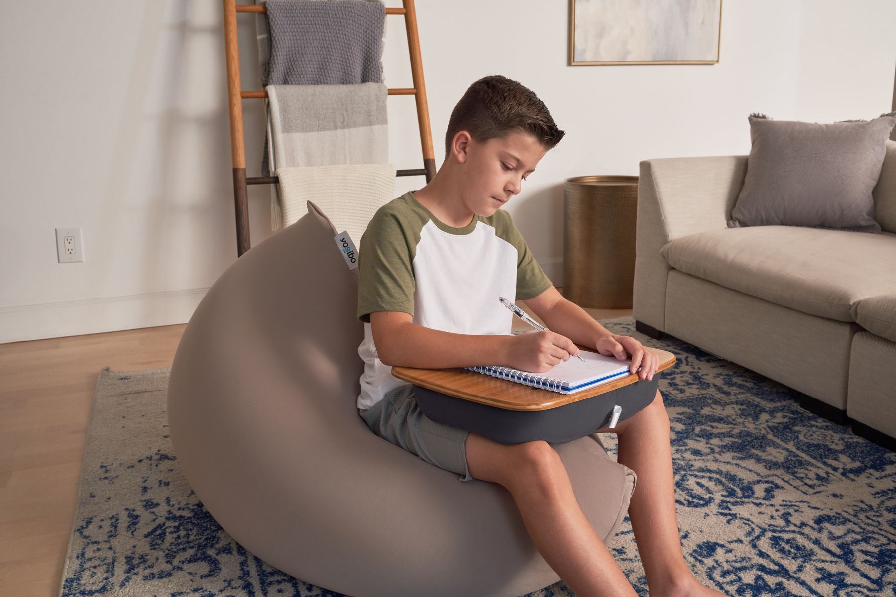 Back to School — study on a Yogibo with a Traybo lap desk