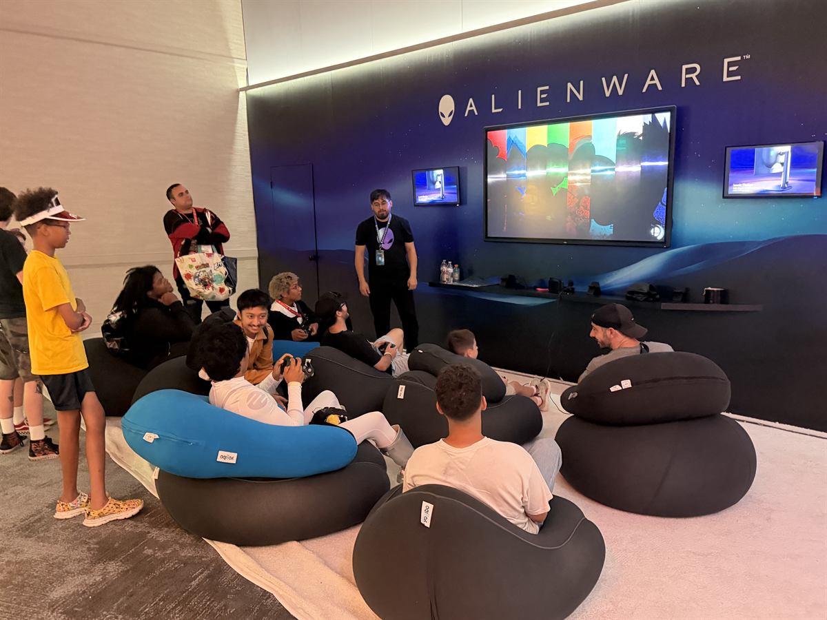 Attendees gaming in the Alienware lounge