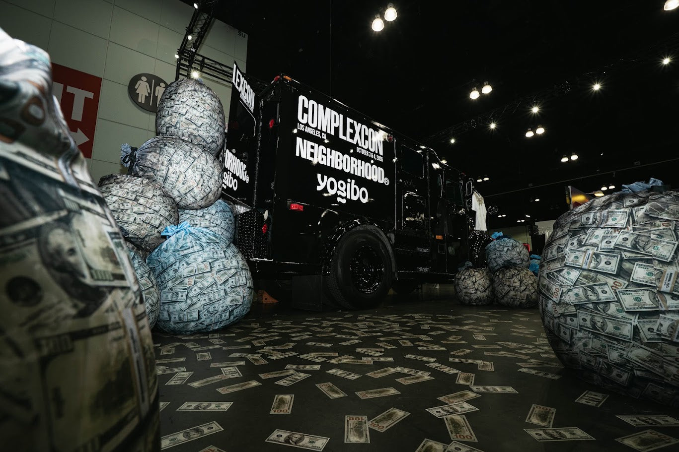 The NEIGHBORHOOD × Yogibo money-truck installation with cash bean bags at ComplexCon Los Angeles
