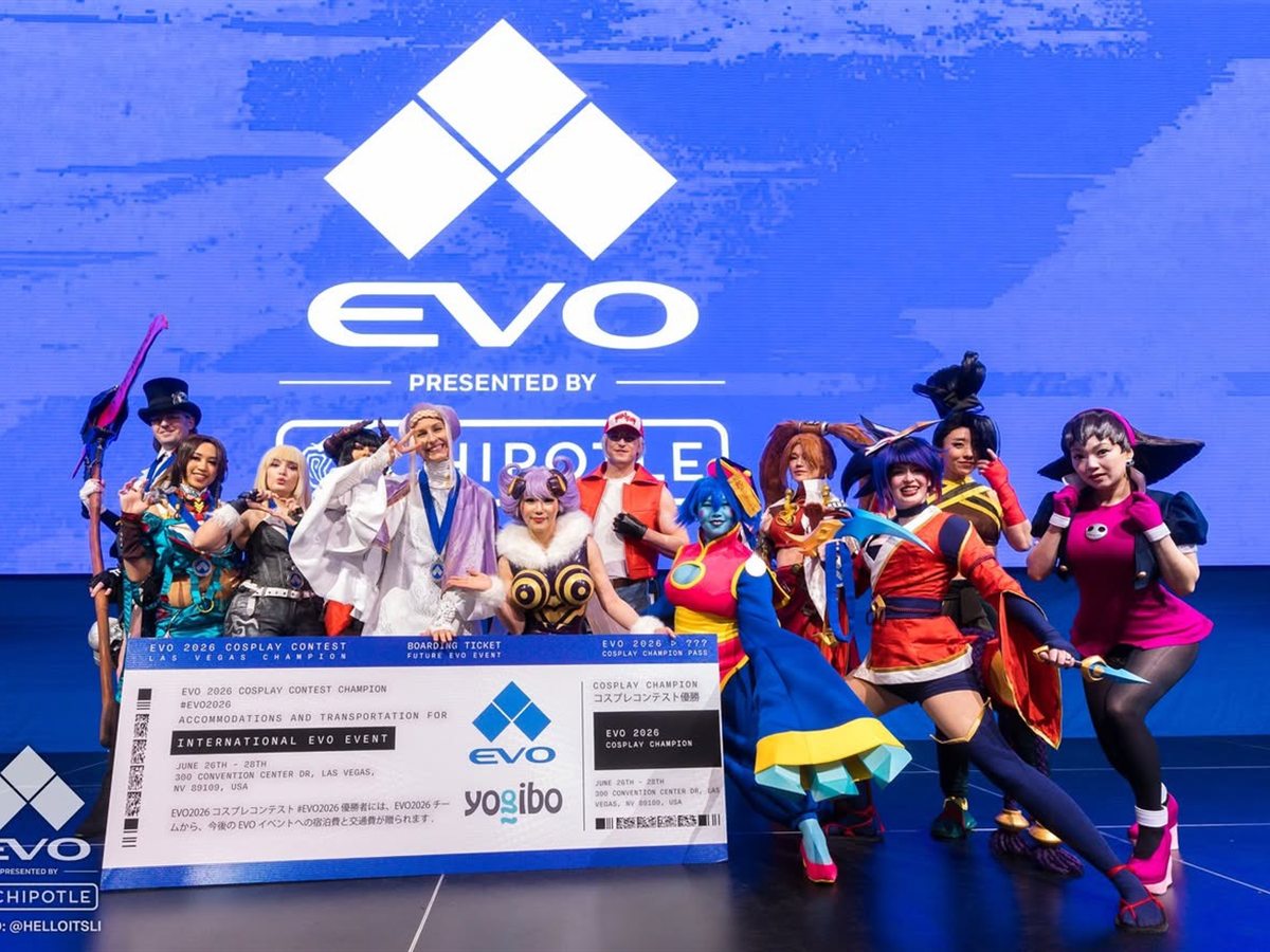 Cosplay contest champions on stage at EVO Ultimate Fighting Championship, presented with the Yogibo prize cheque