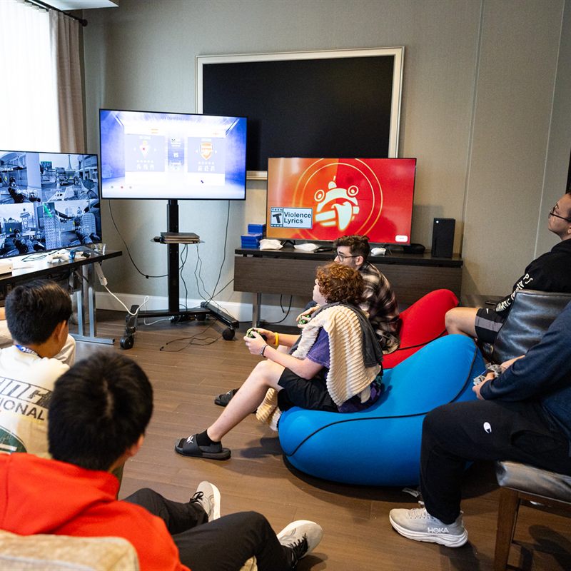 Players on Yogibo bean bags in the MIB Agents gamer space